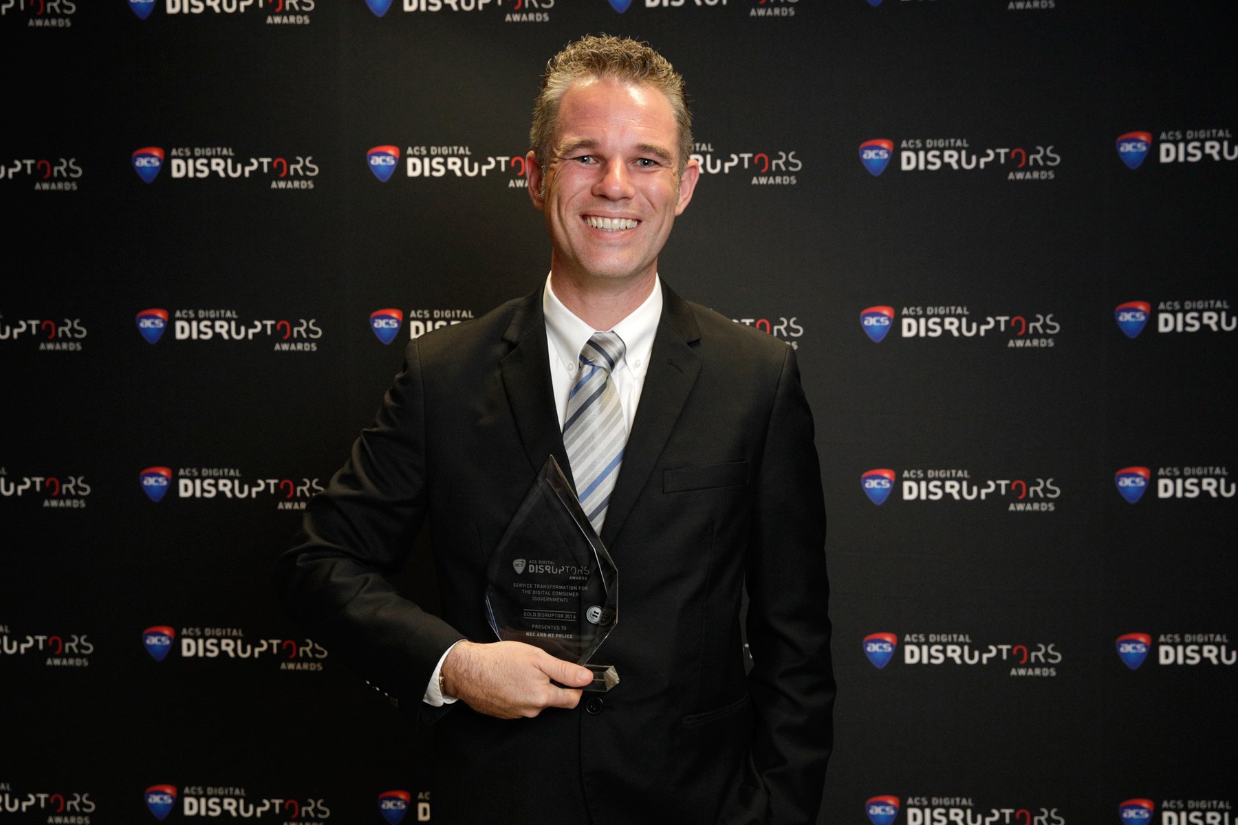 Benjamin Smith holding ACS Digital Disruptor recognition for the Police Watchhouse work.
