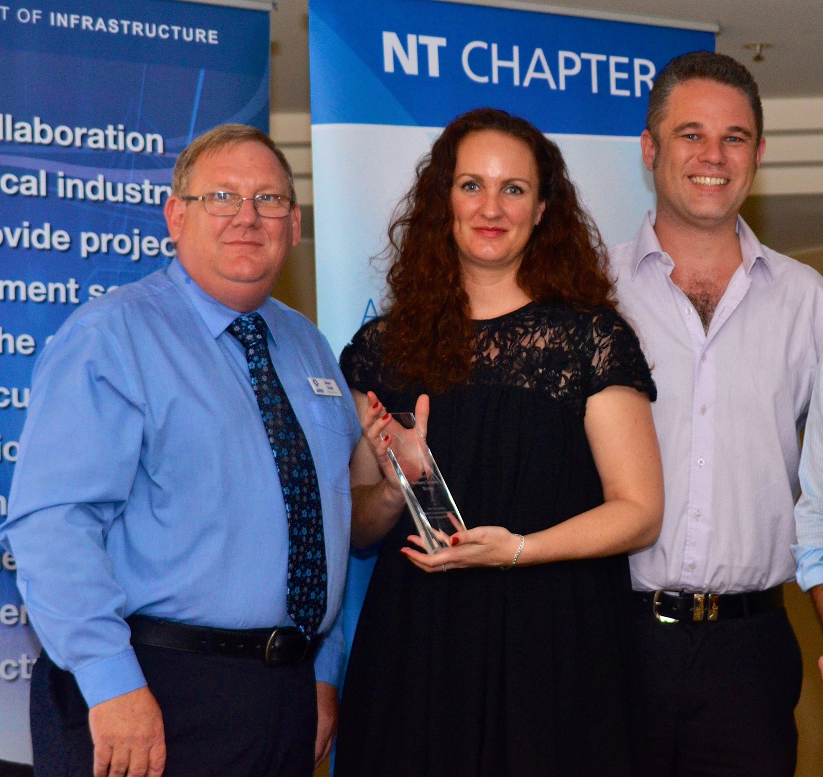 Benjamin Smith and NEC colleagues receiving ICT project recognition in the Northern Territory.